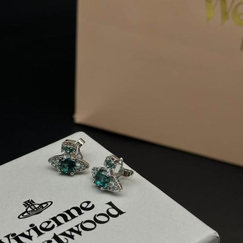 Emerald single diamond Saturn earrings