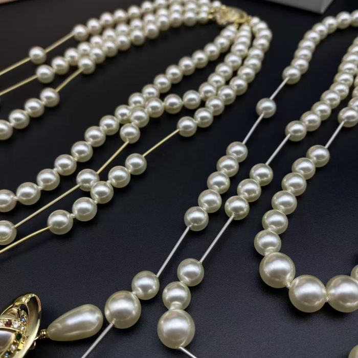 Broken pearl necklace gold/silver