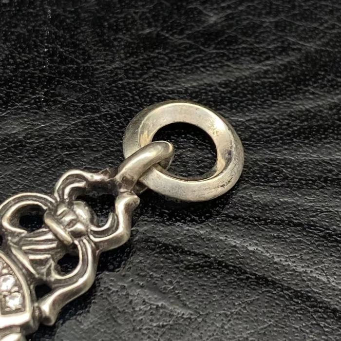 Small diamond ring sword pendant