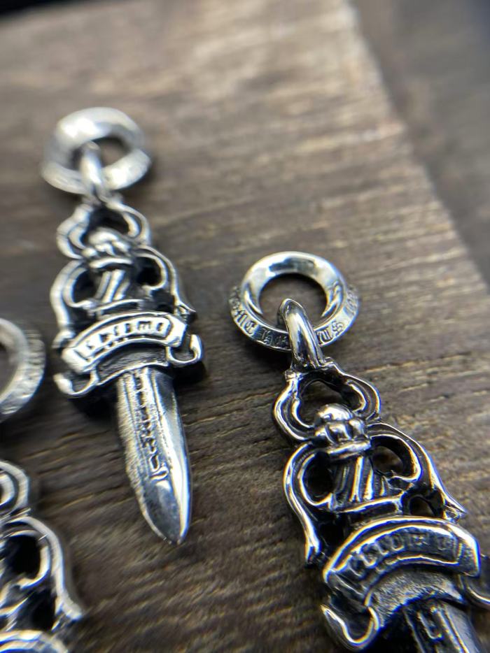 Diamond pendant with small sword