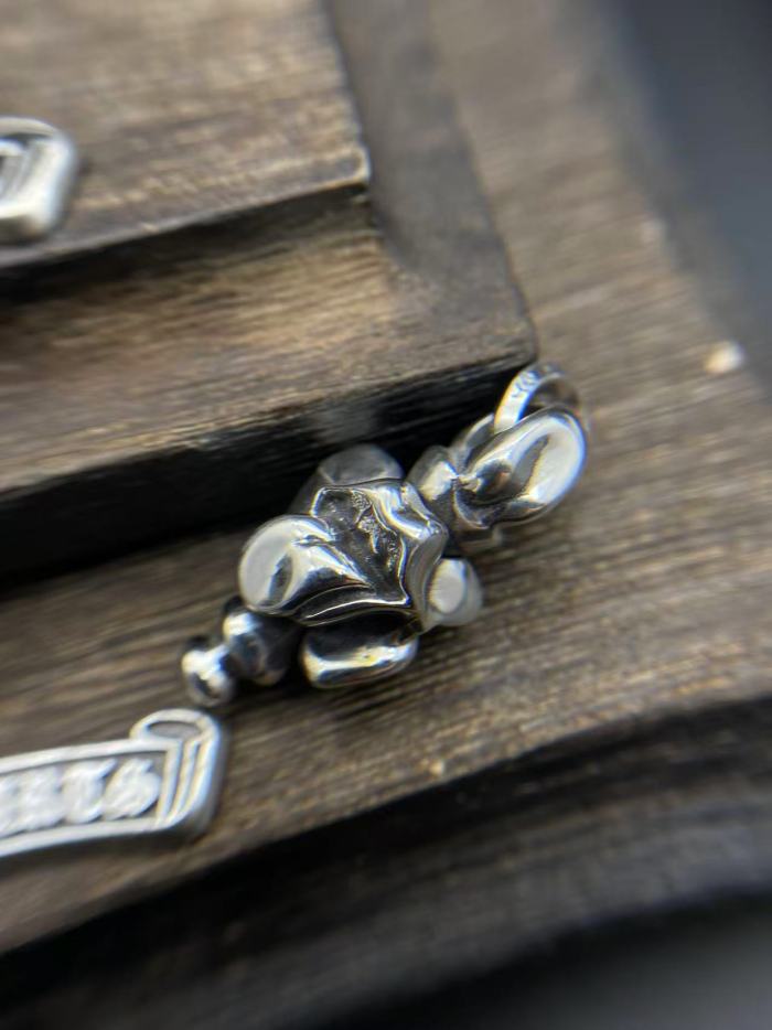 Rotating tongue pendant