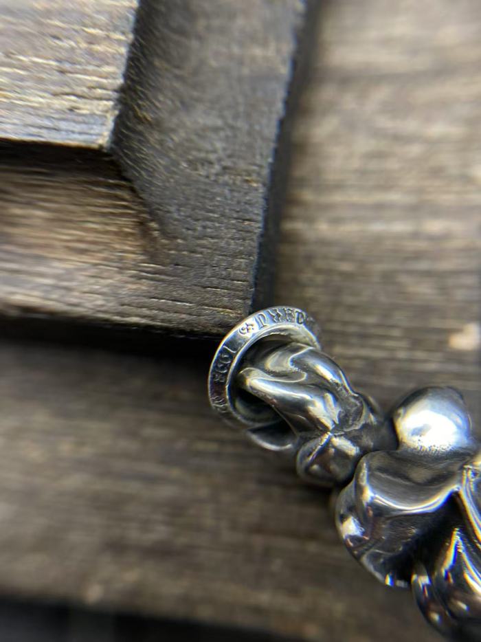 Rotating tongue pendant