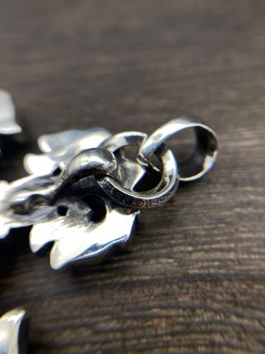 Large flame cross pendant