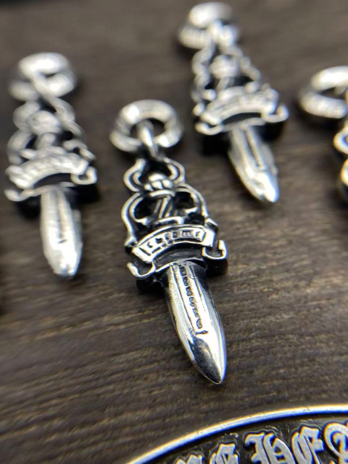 Diamond pendant with small sword